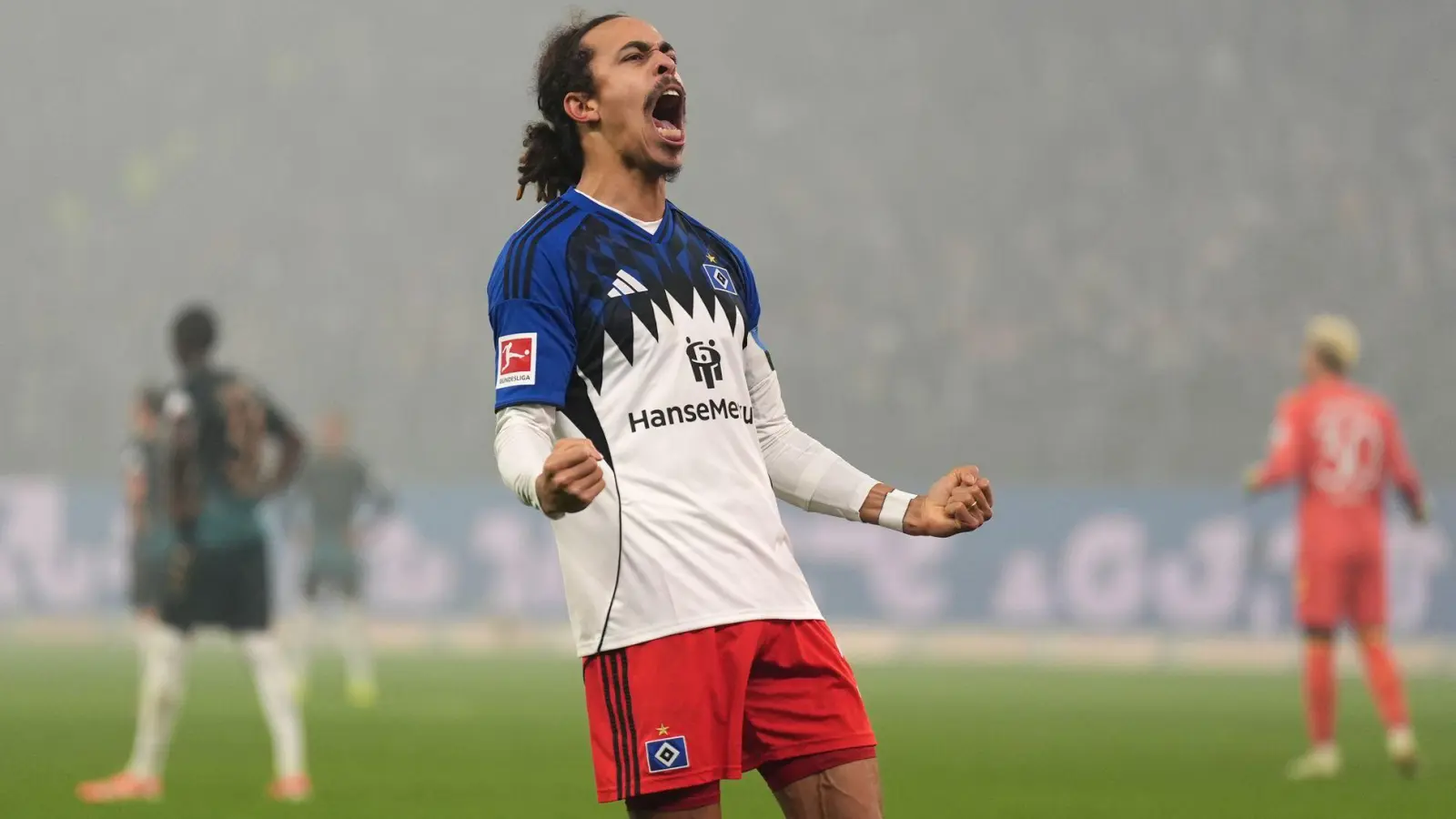 Bejubelt sein Siegtor gegen Werder Bremen: Yussuf Poulsen vom Hamburger SV. (Foto: Marcus Brandt/dpa)