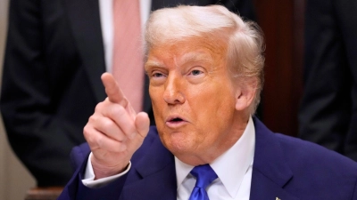 Die deutsche Gründerbranche setzt auf ausländische Talente - und die USA, wo Donald Trump für Turbulenzen sorgt (Archivbild). (Foto: Mark Schiefelbein/AP/dpa)
