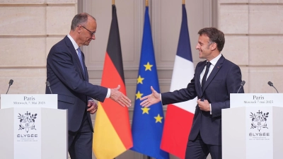 Wollen die deutsch-französische Achse stärken: Frankreichs Präsident Emmanuel Macron und Bundeskanzler Friedrich Merz.  (Foto: Michael Kappeler/dpa)
