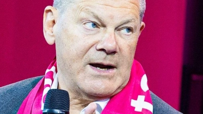 Olaf Scholz spricht auf dem Kirchentag in Hannover auch über seine Wehrdienstverweigerung.  (Foto: Moritz Frankenberg/dpa)