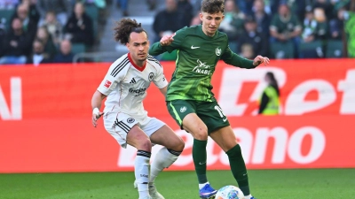 Lindström (r.) spielte für Wolfsburg und die Eintracht. (Archivfoto) (Foto: Swen Pförtner/dpa)