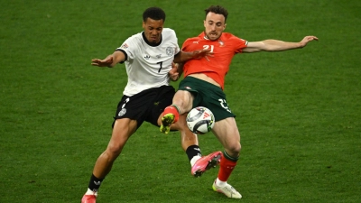 Im Juni gehörte Diogo Jota (r.) zu Portugals Siegermannschaft in der Nations League.  (Foto: Peter Kneffel/dpa)