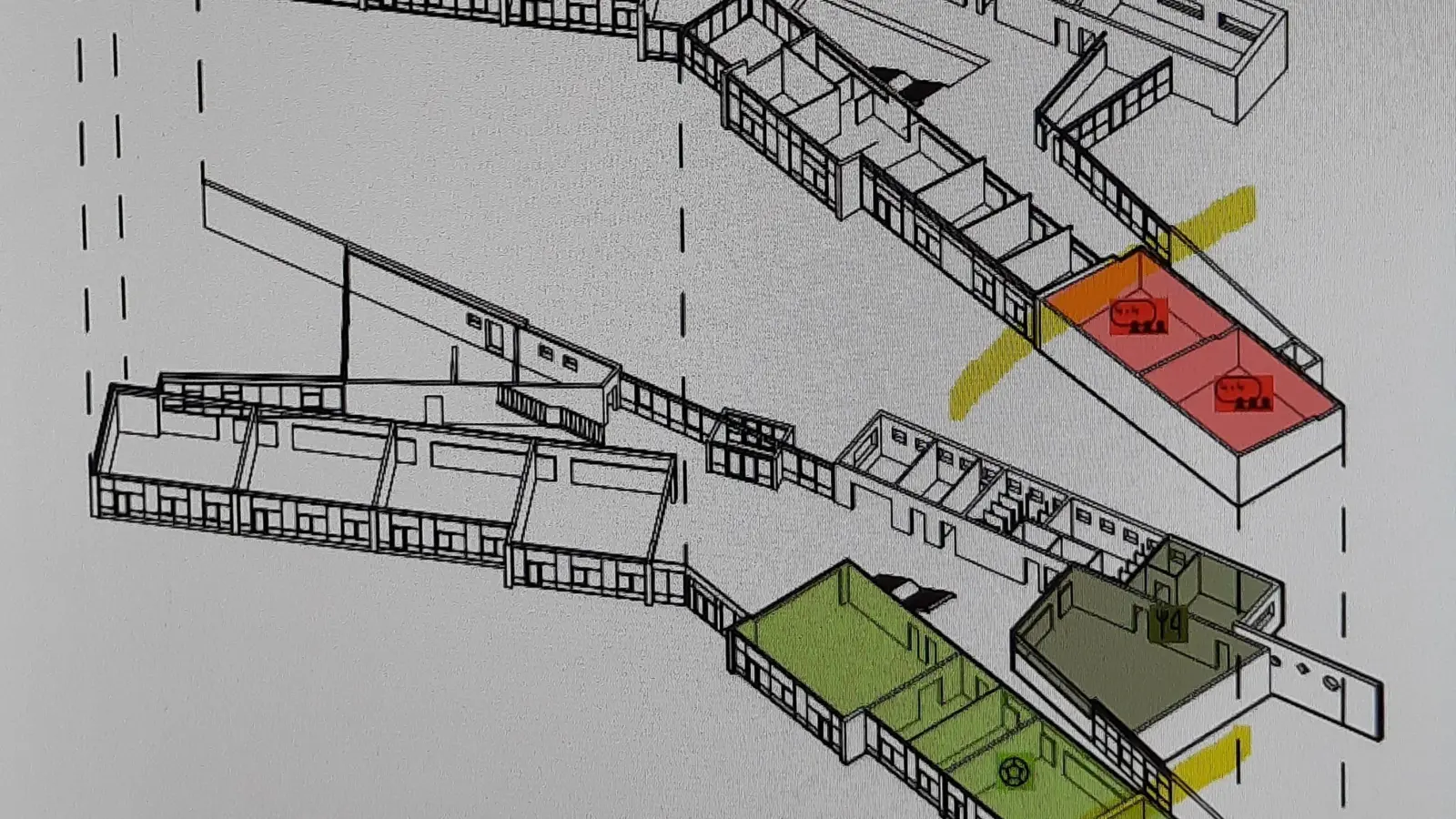 Das helle Grün markiert den so genannten Betreuungsriegel im nach Osten erweiterten Erdgeschoss der Comenius-Grundschule, der dunkelgrüne Raum steht für die künftige Mensa. Im Obergeschoss (rot) sind die beiden neu zu bauenden Klassenzimmer. (Foto: H2 plus Architekten/Lars Hühnken)