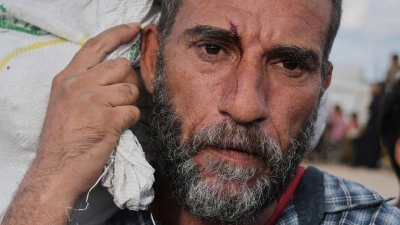 Immer wieder gibt es Berichte über tödliche Zwischenfällen in der Nähe von Verteilzentren. (Archivbild) (Foto: Abdel Kareem Hana/AP/dpa)