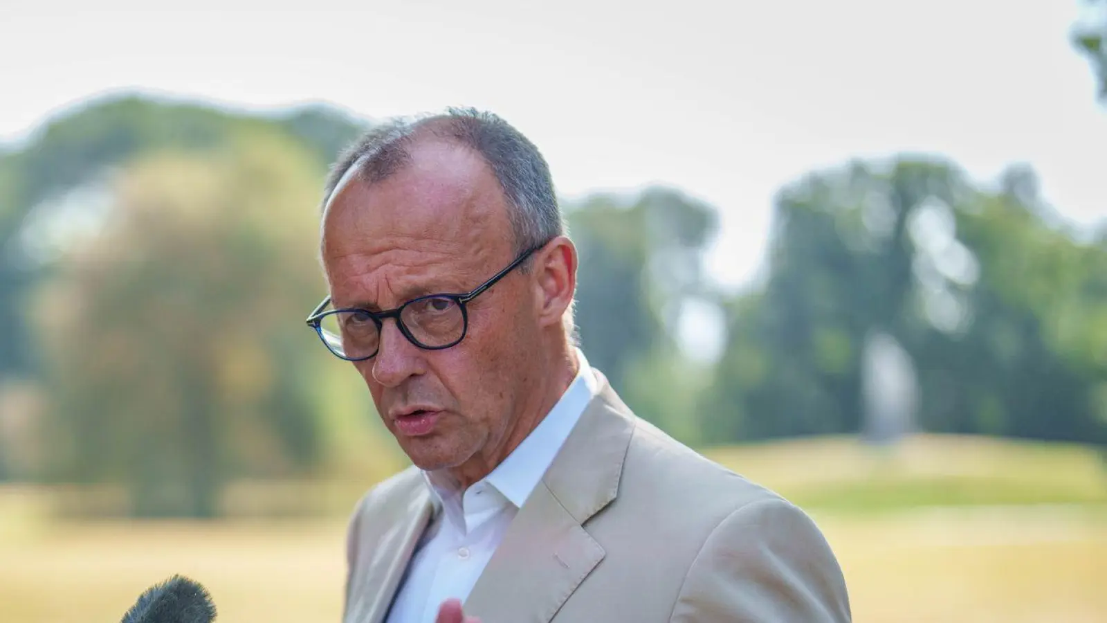 CDU-Chef Friedrich Merz unterstützt die Forderungen nach mehr Rechten für die Polizei von Münchens OB. (Foto: Michael Kappeler/dpa)