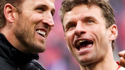 Harry Kane und Thomas Müller freuen sich nach ihrer ersten Meisterfeier auf ein weiteres besonderes Wochenende. (Foto: Jan Woitas/dpa)