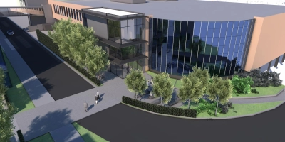 Die Visualisierung zeigt deutlich das Treppenhaus, das zu den neuen Räumen der Hochschule führen wird, und den ebenerdigen Übergang zum bestehenden Campus. Im Hintergrund ist die verglaste Brücke zu sehen. (Visualisierung: DV Plan GmbH)
