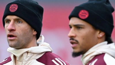 Bayern-Zukunft offen: Thomas Müller (l) und Leroy Sané. (Foto: Sven Hoppe/dpa)