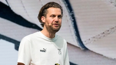 Arne Freundt, CEO von Puma, bei seiner Präsentation während des Festakts zum 75-jährigen Bestehen des Sportartikelherstellers Puma. (Foto: Daniel Vogl/dpa)