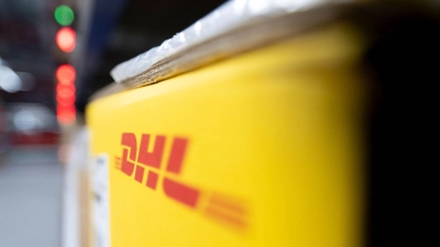 DHL-Pakete  (Foto: Hendrik Schmidt/dpa)