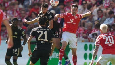 Die Meister-Bayern fanden in Mainz lange Zeit nicht ins Spiel - drehten dann aber auf. (Foto: Thomas Frey/dpa)