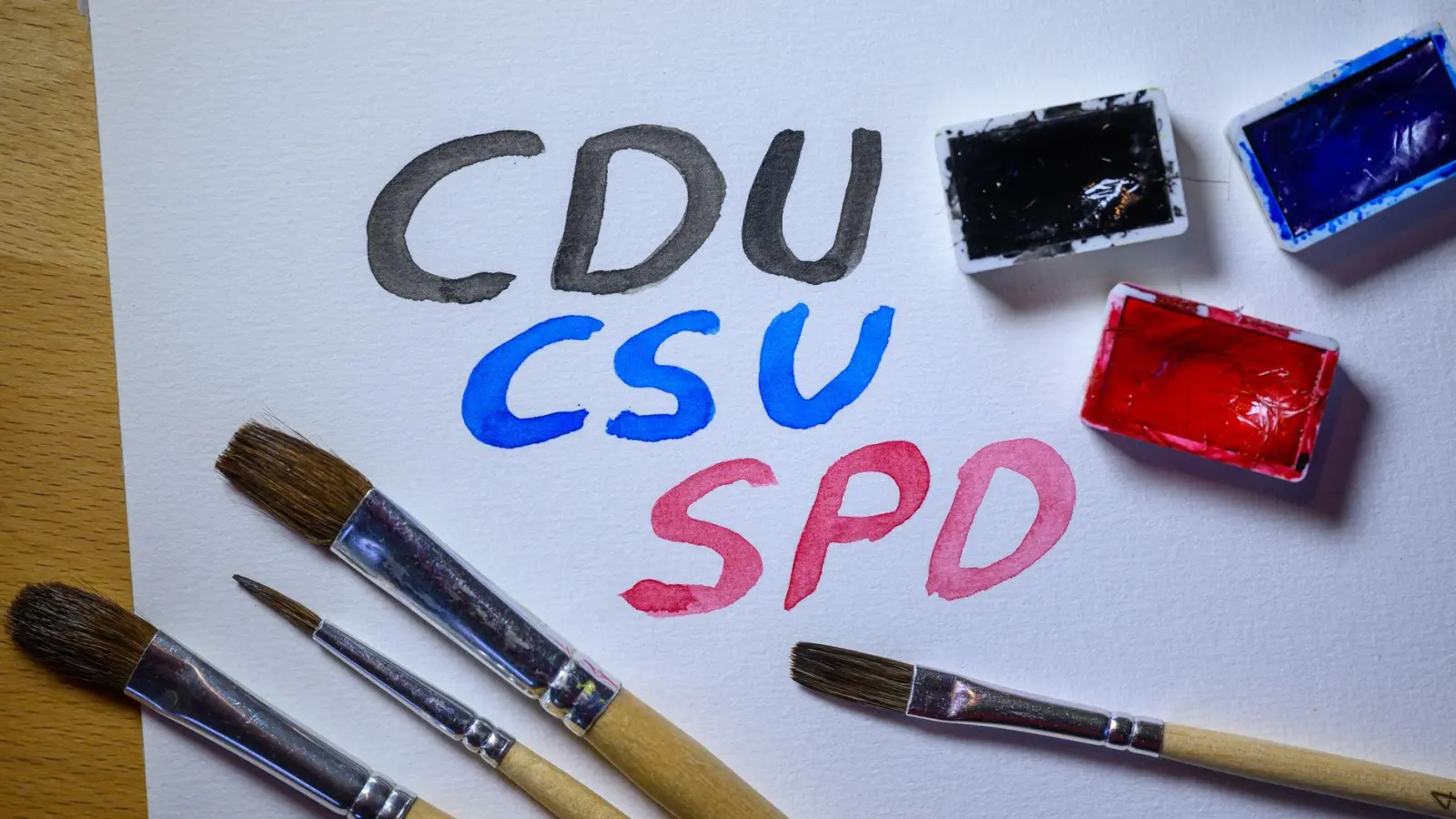 CDU, CSU und SPD wollen am Montag wieder zusammenkommen. (Symbolbild) (Foto: Hendrik Schmidt/dpa)