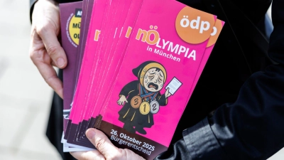 Wenige Tage vor der Bürgerbefragung versuchen Olympia-Gegner weiter, die Münchner von einem „Nein“ zu überzeugen. (Foto: Matthias Balk/dpa)