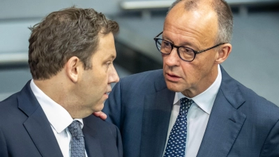 Kanzler und Vizekanzler bemühen sich um gemeinsame Botschaften. (Archivbild) (Foto: Michael Kappeler/dpa)