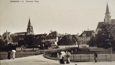 Die Laterne am Ende des Eisernen Stegs – hier auf einer historischen Postkarte zu sehen – brennt Anfang des Jahres 1926 schon seit einigen Wochen nicht. (Foto: Sammlung Breitschwert)
