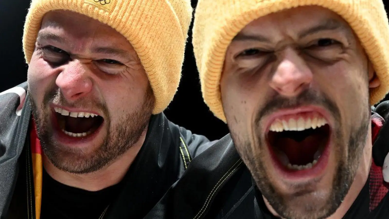 Johannes Lochner (l) und Georg Fleischhauer sind am Ziel: Gold im Zweierbob. (Foto: Robert Michael/dpa)