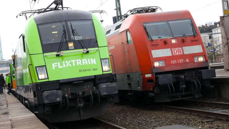 Gleis an Gleis: Flixtrain und die dominierende Konkurrenz Deutsche Bahn. (Archivbild)  (Foto: Christian Charisius/dpa)