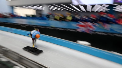 Skeleton-Weltmeister Christopher Grotheer aus Deutschland in Aktion bei den Olympischen Winterspielen in Peking. (Foto: Robert Michael/dpa-Zentralbild/dpa)