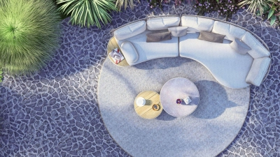 Wie aus einem Guss: Das Outdoorsofa von Zebra fügt sich mit dem Teppich und den beiden Tischen elegant als Einheit zusammen. (Foto: Zebra Group/dpa-tmn)