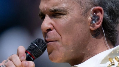 Robbie Williams hat ein neues Album auf den Markt gebracht. (Archivbild) (Foto: Sven Hoppe/dpa)