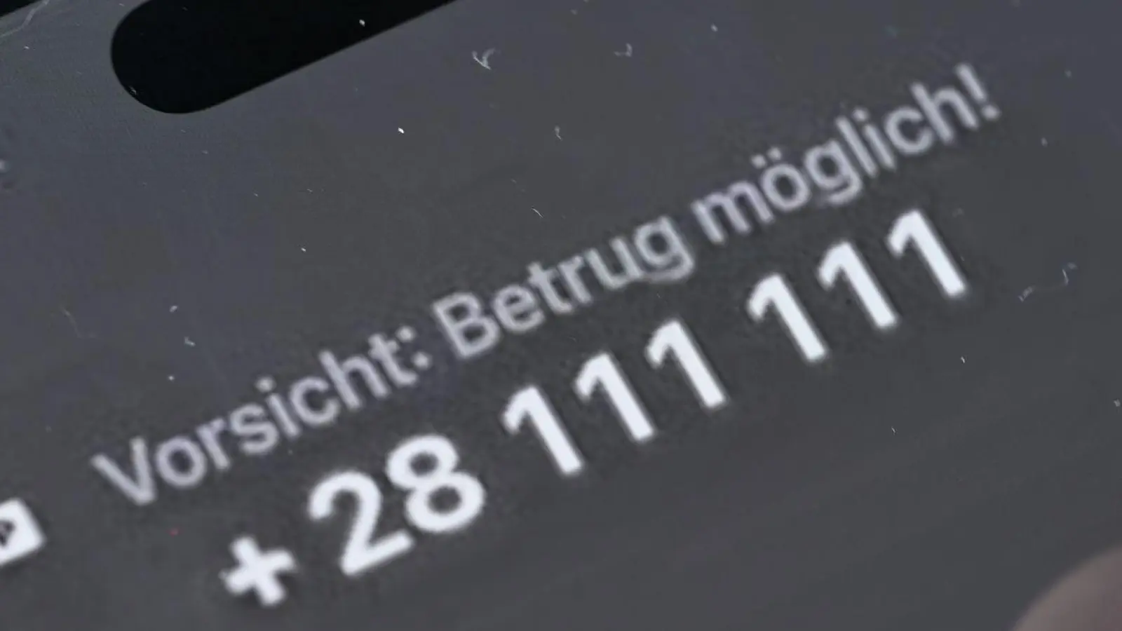 So sieht der Warnhinweis von Vodafone aus, bei der Telekom wird marginal anders gewarnt: „Vorsicht, möglicher Betrug!” (Foto: Wolf von Dewitz/dpa)