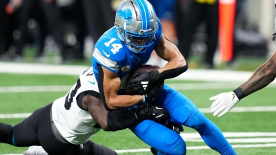 Zwei weitere Touchdowns in einer starken Saison: Amon-Ra St. Brown und die Detroit Lions dominieren in der NFL. (Foto: Carlos Osorio/AP/dpa)