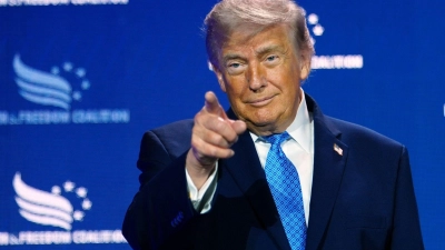 Trump verdiente Hunderte Millionen mit Krypto-Geschäften. (Archivbild) (Foto: Julia Demaree Nikhinson/AP/dpa)