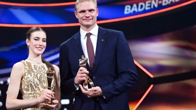 Deutschlands Sportlerin und Sportler des Jahres, Darja Varfolomeev und Oliver Zeidler, freuen sich auf besinnliche Tage.  (Foto: Bernd Weißbrod/dpa)