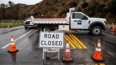 Augenzeugen berichteten nach dem Wintersturm von umgestürzten Bäumen, überschwemmten Straßen und kleineren Erdlöchern. (Foto: Ethan Swope/FR171736 AP/AP/dpa)