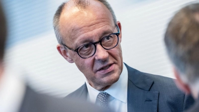 Merz weist die SPD-Vorwürfe erneut zurück. (Foto: Michael Kappeler/dpa)