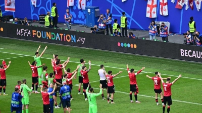 Die Georgier holten den ersten Punkt bei einem großen Fußball-Turnier. (Foto: Sina Schuldt/dpa)