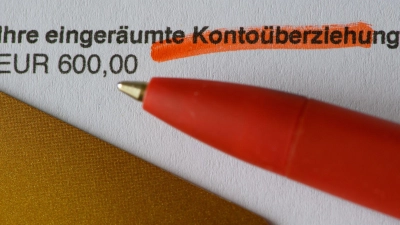 Die Frage einer Deckelung von Dispo-Zinsen wird in dem Entwurf nicht thematisiert. (Symbolbild) (Foto: Robert Michael/dpa-Zentralbild/dpa)