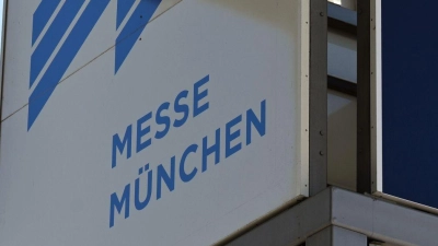 Ein Schild weist auf die Messe München hin. (Foto: Martin Schutt/dpa/Symbolbild)