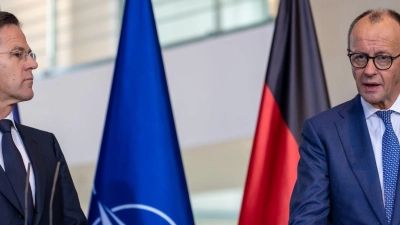 Kanzler Merz und Nato-Generalsekretär Rutte treten gemeinsam vor die Presse. (Foto: Michael Kappeler/dpa)