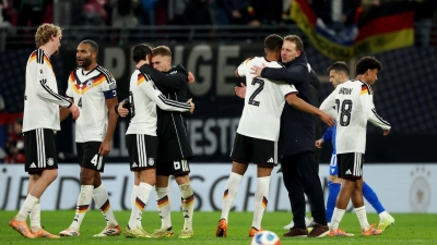 Alle erleichtert: Deutschland feiert das WM-Ticket. (Foto: Christian Charisius/dpa)