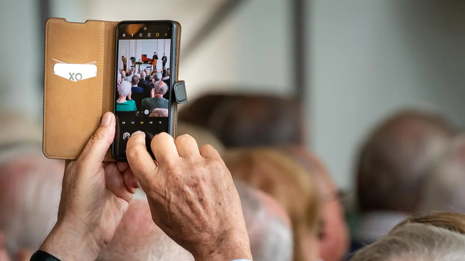 Ein Schnappschuss zur Erinnerung – aber erst beim Applaus. (Foto: André De Geare)