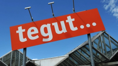 Das Tegut-Logo an einem Standort der Handelskette. (Foto: Uwe Zucchi/dpa)