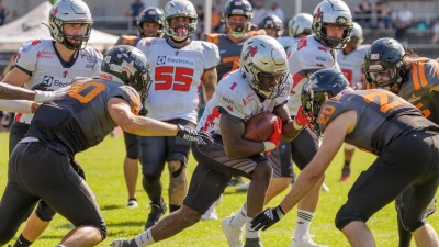 Rothenburgs Dwayne Milton (am Ball) glänzte gegen München mit drei Touchdowns. (Foto: Thomas Lüdtke)